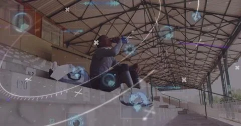 Image of digital data processing over disabled male athlete with running blades Foto stock