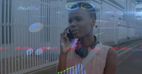 Image of digital data processing over african american woman using smartphone Stock Photos