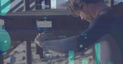 Image of digital data processing over caucasian surfer Foto stock