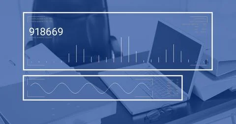 Image of digital data processing over laptop on desk in office 写真素材