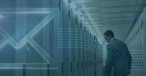 Image of digital envelope icon over man in tech room with computer servers Stock Photos