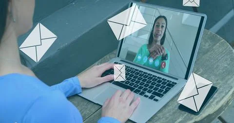 Image of digital envelope mail icons over woman using laptop on image call Stock Photos