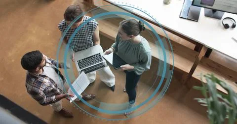 Image of digital icon and data processing over diverse business people in office Stock Photos