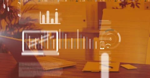 Image of digital icons and data processing over laptop on desk 스톡 사진