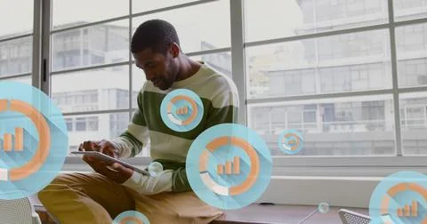 Image of digital icons with data processing over african american businessman in Foto stock