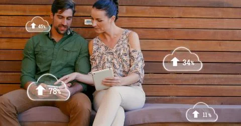 Image of digital interface with cloud icons with numbers growing and data Foto stock