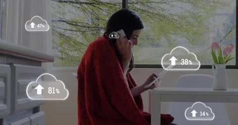Image of digital interface with cloud icons and numbers growing over woman Stock Photos