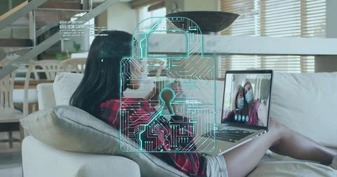 Image of digital padlock icon and data processing over woman using laptop on Foto stock