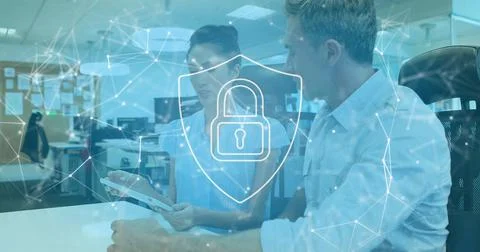 Image of digital padlock icon over diverse businesspeople in office Stockfoto's