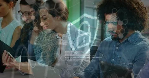 Image of digital shield with padlock over happy diverse female and male Foto stock
