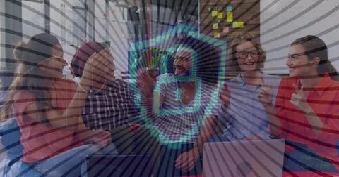 Image of digital shield with padlock over happy diverse female and male Stockfoto's