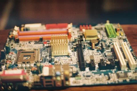 An image displaying a Circuit Board hosting a variety of Electronic Elements Foto stock