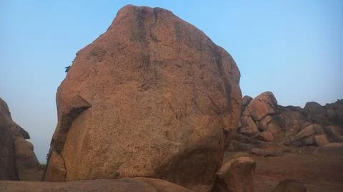 The image displays the distinctive boulder landscape found in Hampi, India.  Stock Photos