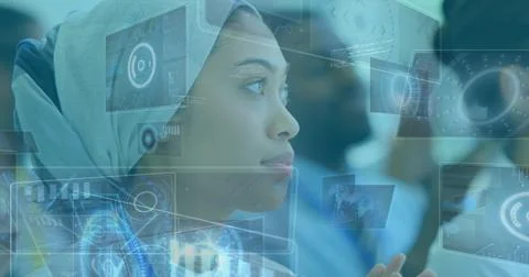 Image of diverse data on digital screen over biracial businesswoman clapping Stock Photos