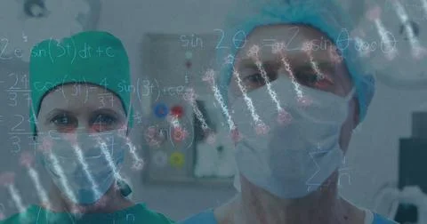 Image of dna strand and data processing over caucasian surgeons with face masks Foto stock