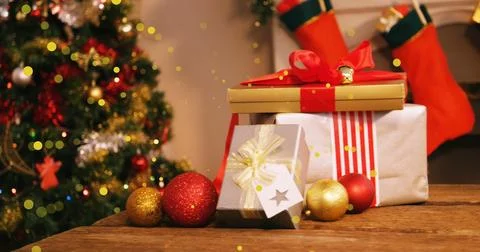 Image of dots moving over presents and christmas tree Stock Illustration