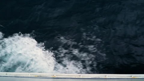 Image of dramatic waves breaking near a boat, Croatia. Stock Footage 107576770