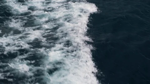 Image of dramatic waves breaking near a boat, Croatia. Stock Footage 107576774