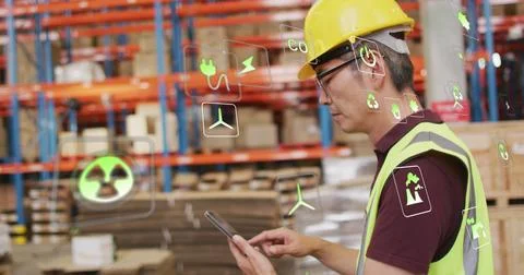 Image of eco icons and data processing over biracial man working in warehouse Foto stock