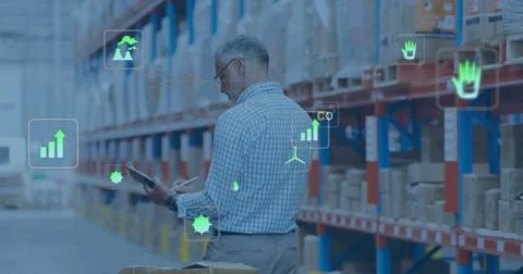 Image of eco icons and data processing over caucasian man working in warehouse Stock Photos