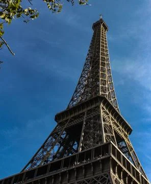 Image of Eiffel tower under blue sky. Stock Photos