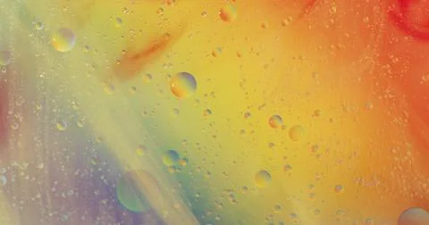 Image of elements over bubbles and colorful liquid Fotos Stock