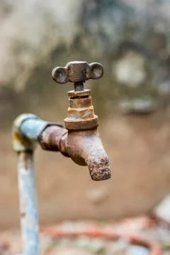 Image of a empty and dry water tap Stock Photos