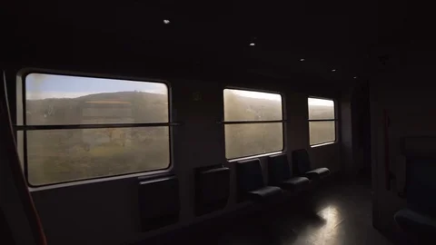 Image of empty passenger train wagon crossing the countryside, Italy. Video stock 107534881