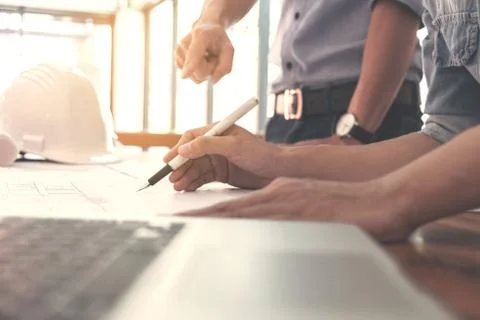 Image of engineer or architectural project, two engineering discussing and wo Stock Photos
