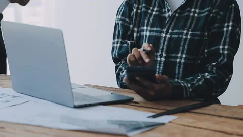 Image of engineering objects on workplace with three partners interacting o.. Stock Footage 239971149