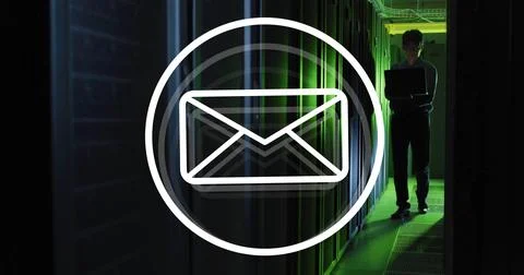 Image of envelope email icon over male technician with laptop in dark computer イラスト素材
