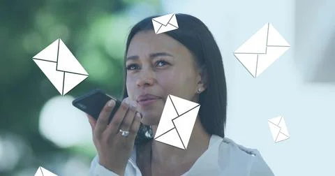Image of envelope mail icons falling over woman talking on smartphone Stock Photos