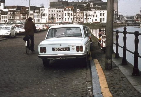 Image of a (error) parked car along the Nieuwekade in Utrecht. Copyright: ... Stock Photos