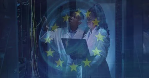 Image of eu flag over african american couple using laptop in server room Fotos Stock