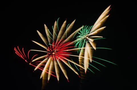 An image of exploding fireworks at night Stock Photos
