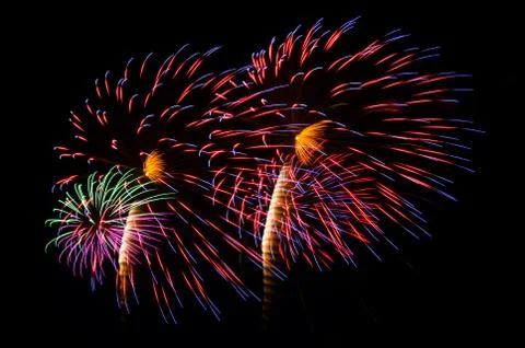 An image of exploding fireworks at night Stock Photos