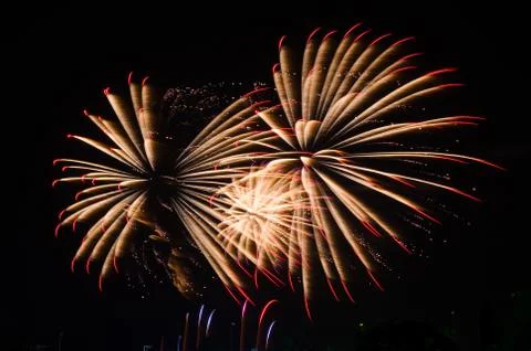 An image of exploding fireworks at night Stock Photos