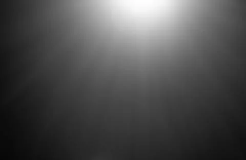 An image of a fairing lens, formed by the reflection of light shining through Stock Photos