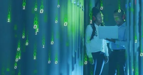 Image of falling binary codes, african american coworkers discussing in server Stock Photos