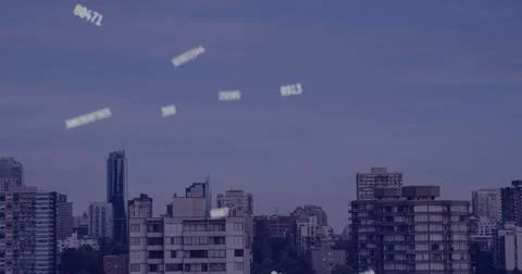 Image of falling numbers over cityscape Stock Photos