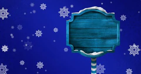 Image of falling snowflakes over blank wooden sign with copy space Ilustração Stock