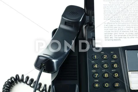 Image of fax machine with printed document in it Stock Photos