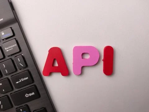 The image features the acronym API spelled out in red and pink letters next.. Stock Photos