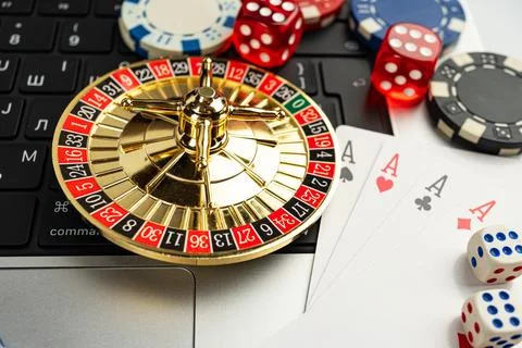 Image features casino table game elements like chips, cards, and dice, emphas Stock Photos