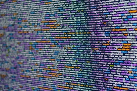 The image features a close-up of colorful data cables in a complex, structu.. Foto stock