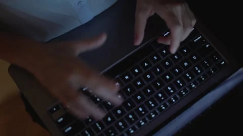 This image features a closeup shot that captures hands actively typing on a Stock-Footage 289967093