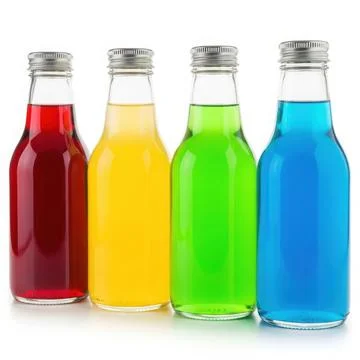 This image features four glass bottles, each containing a different colored.. Stock Illustration