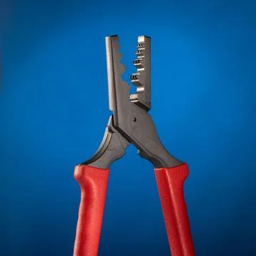 This image features specialized crimping pliers designed for crimping the end Stock Photos