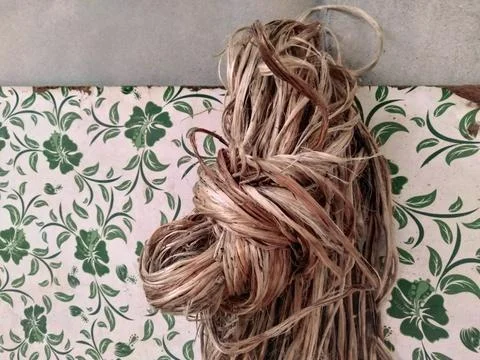 The image features a tangled ball of yarn, which is tied in a knot, sitting.. Stock Photos