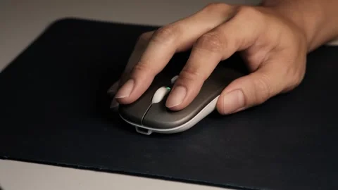 Image of female hand touching computer mouse. Stock Footage 309218503